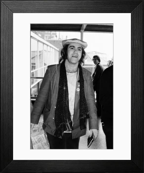 Framed Print : Elton John, pictured at Heathrow Airport, after his eight trail-blazing concerts in Framed Print : Elton John, pictured at Heathrow Airport, after his eight trail-blazing concerts in