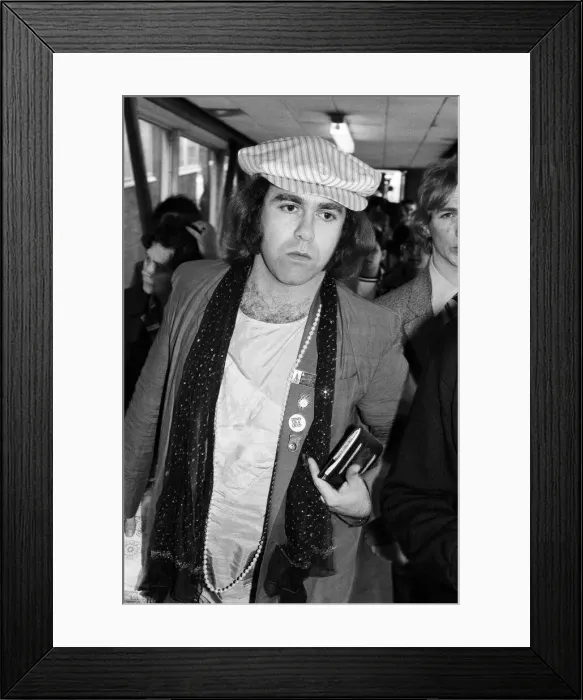 Framed Print : Elton John, pictured at Heathrow Airport, after his eight trail-blazing concerts in Framed Print : Elton John, pictured at Heathrow Airport, after his eight trail-blazing concerts in