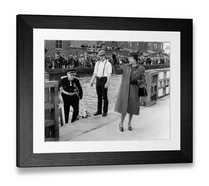 Framed Print : Queen Elizabeth II visits Wigan Pier. The Queen waves to the crowd on the Quayside Framed Print : Queen Elizabeth II visits Wigan Pier. The Queen waves to the crowd on the Quayside