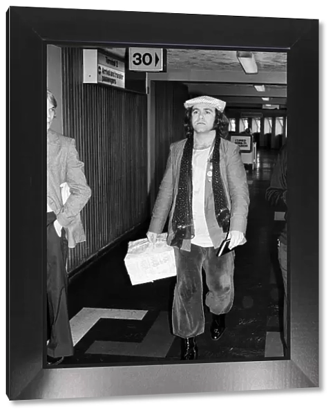 Elton John, pictured at Heathrow Airport, after his eight trail-blazing concerts in