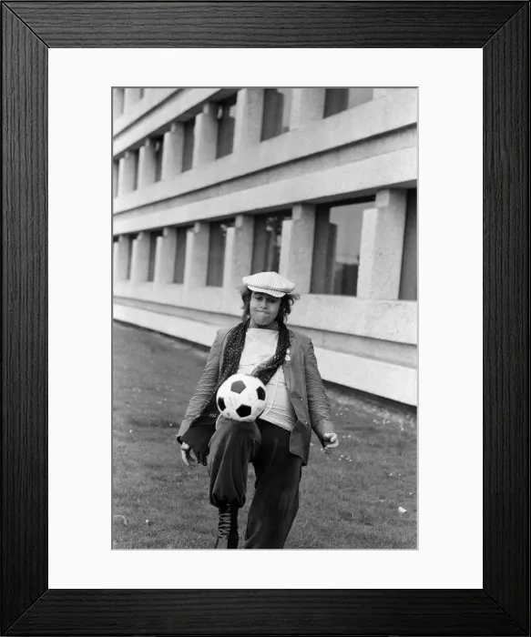 Framed Print : Elton John, arrives back in London after his successful tour of Russia