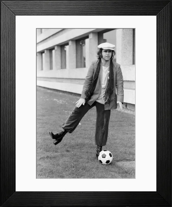Framed Print : Elton John, arrives back in London after his successful tour of Russia