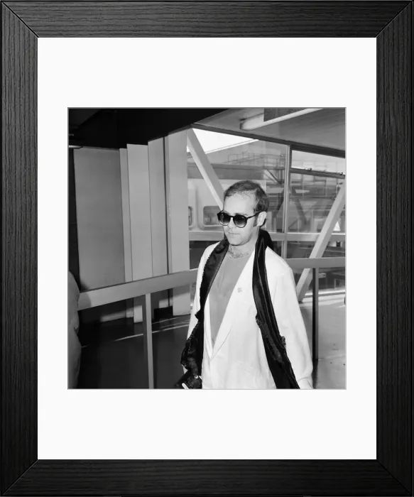 Framed Print : Elton John at London Heathrow Airport. 16th September 1979 Framed Print : Elton John at London Heathrow Airport. 16th September 1979