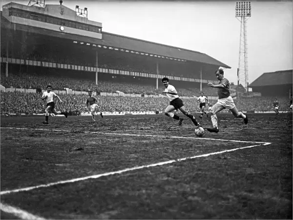 Bobby Charlton for Manchester United races into the 6 yard