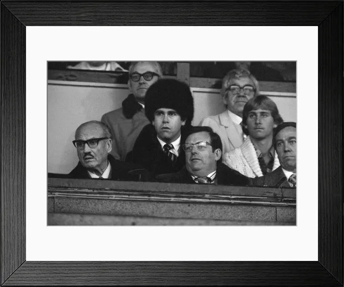 Framed Print : Elton John watching the Watford v Gillingham football match. 11th November 1978