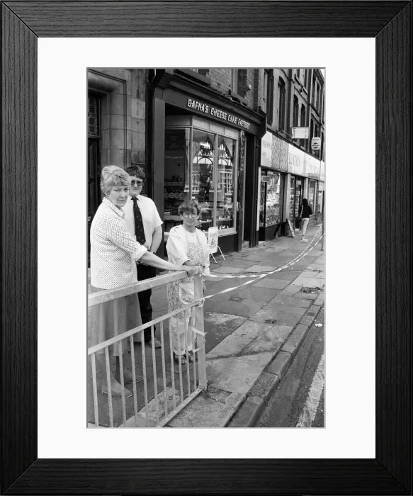 Framed Print : Smithdown Road shopkeepers Mrs Anne Lev (right) and Mrs Elsie Luxton and her son Framed Print : Smithdown Road shopkeepers Mrs Anne Lev (right) and Mrs Elsie Luxton and her son
