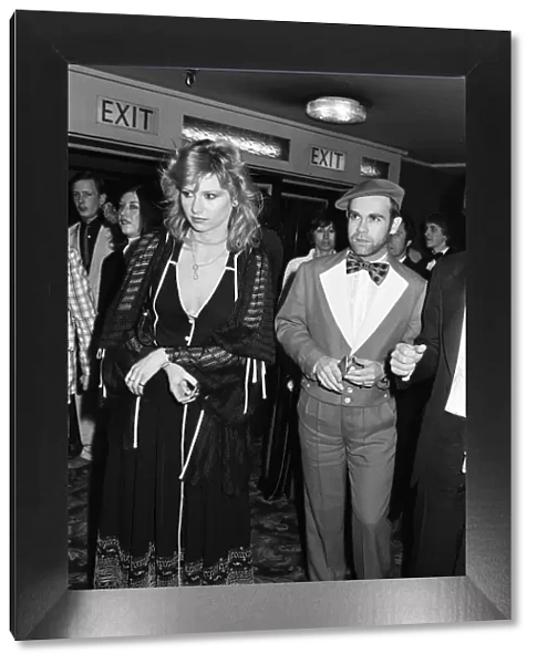 Elton John with guest at Capital Radios awards to the music industry