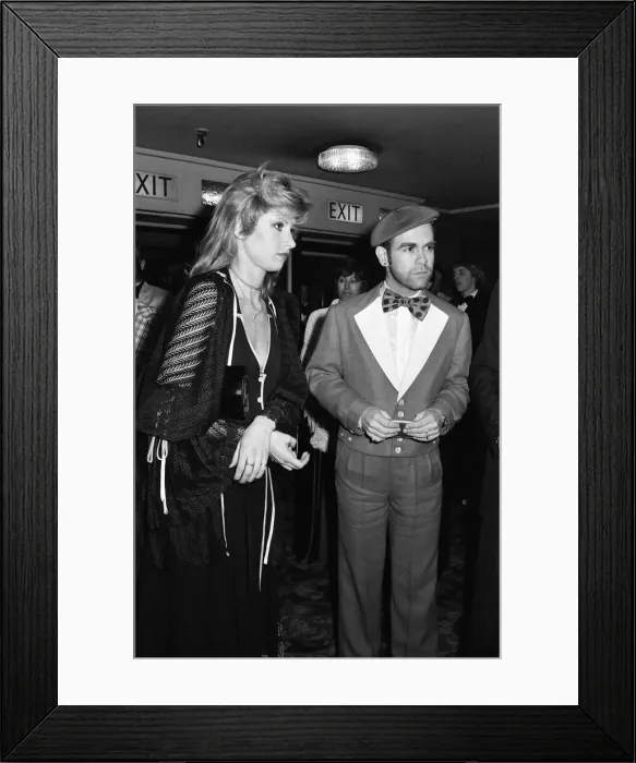Framed Print : Elton John with guest at Capital Radios awards to the music industry Framed Print : Elton John with guest at Capital Radios awards to the music industry