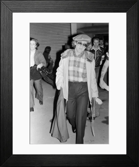 Framed Print : Elton John leaving the Empire Pool Wembley by the back door after he announced his Framed Print : Elton John leaving the Empire Pool Wembley by the back door after he announced his