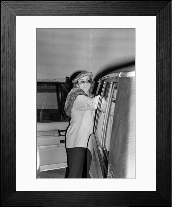 Framed Print : Elton John leaving the Empire Pool Wembley by the back door after he announced his Framed Print : Elton John leaving the Empire Pool Wembley by the back door after he announced his
