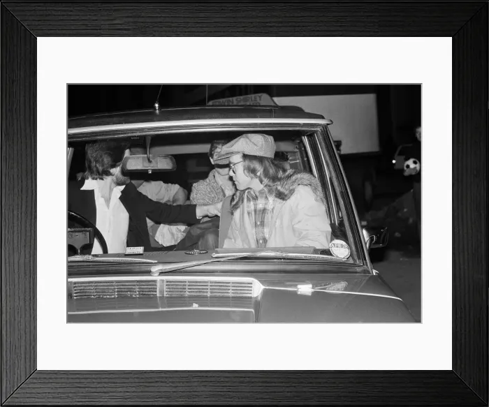 Framed Print : Elton John leaving the Empire Pool Wembley by the back door after he announced his Framed Print : Elton John leaving the Empire Pool Wembley by the back door after he announced his