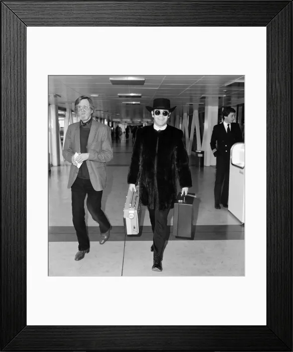 Framed Print : Elton John leaving Heathrow airport for New York on Concorde Framed Print : Elton John leaving Heathrow airport for New York on Concorde
