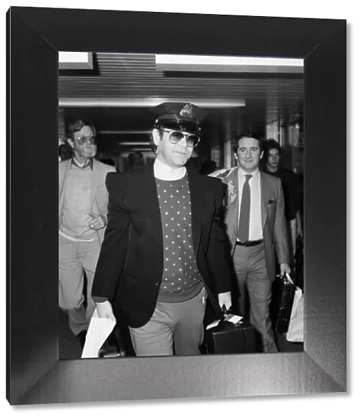 Singer Elton John, arrives at Heathrow airport from his 10 week tour of the States