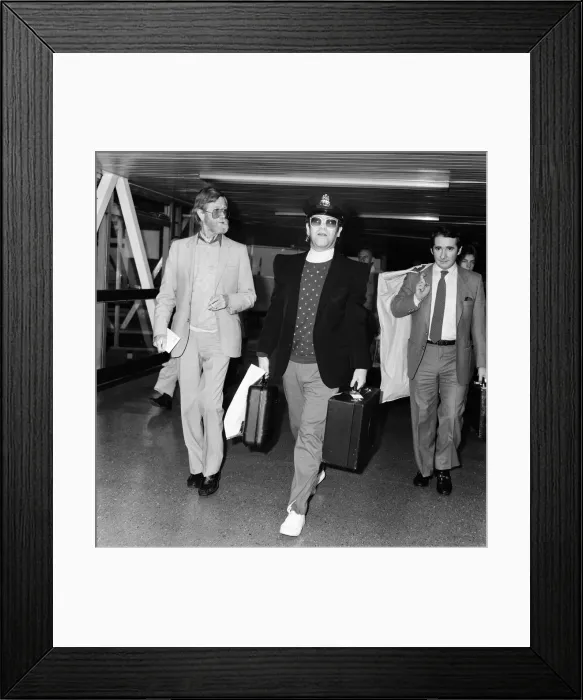 Framed Print : Singer Elton John, arrives at Heathrow airport from his 10 week tour of the States Framed Print : Singer Elton John, arrives at Heathrow airport from his 10 week tour of the States