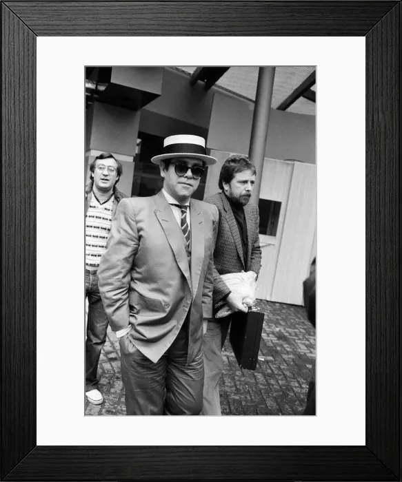 Framed Print : Elton John leaving the TV-am studios. 4th April 1983 Framed Print : Elton John leaving the TV-am studios. 4th April 1983