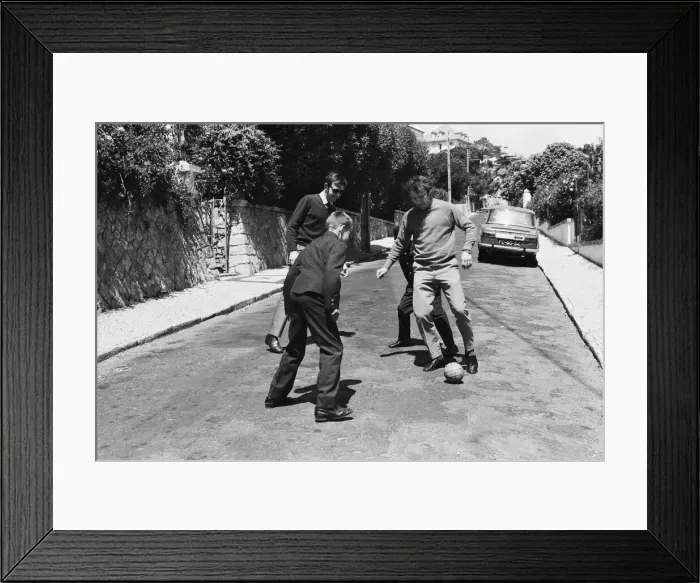 Framed Print : Jimmy Grave takes break from The Daily Mirror World Cup Rally for a quiet game of