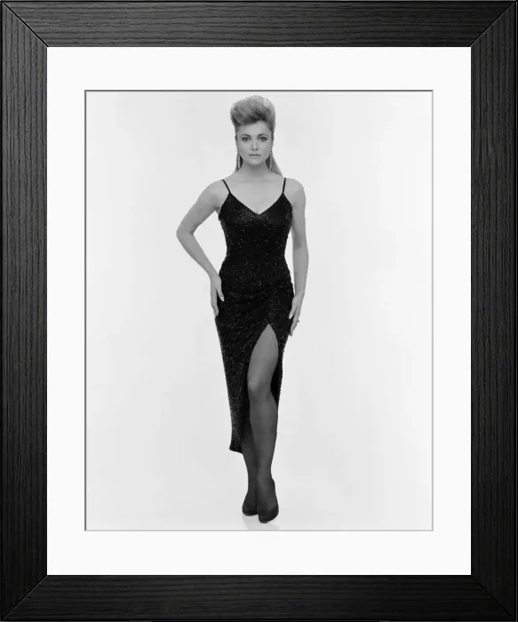 Framed Print : Emma Samms, British actress, studio pix wearing Nolan Miller designed black dress Framed Print : Emma Samms, British actress, studio pix wearing Nolan Miller designed black dress