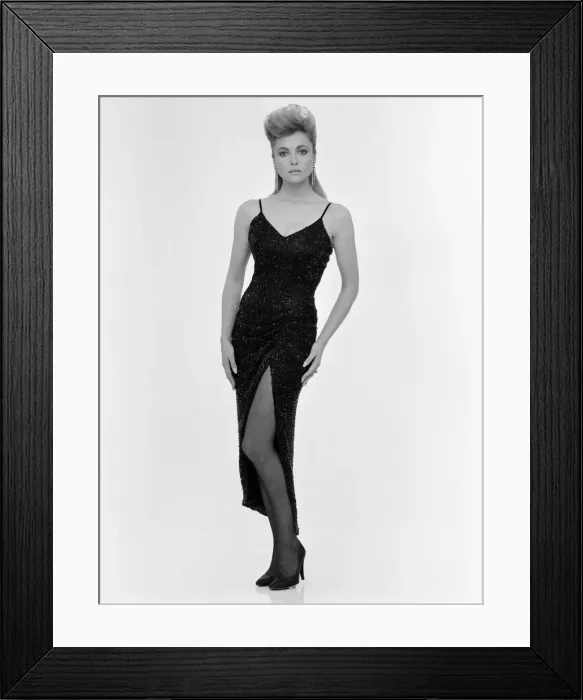 Framed Print : Emma Samms, British actress, studio pix wearing Nolan Miller designed black dress Framed Print : Emma Samms, British actress, studio pix wearing Nolan Miller designed black dress