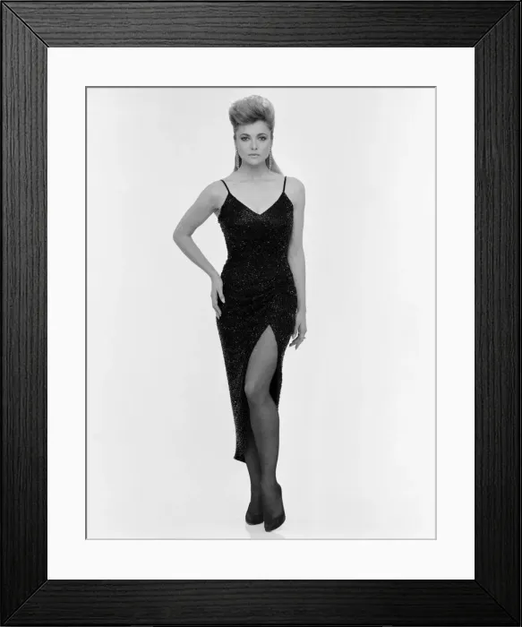 Framed Print : Emma Samms, British actress, studio pix wearing Nolan Miller designed black dress Framed Print : Emma Samms, British actress, studio pix wearing Nolan Miller designed black dress