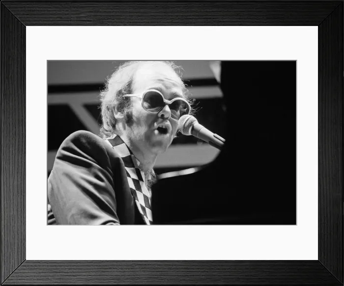 Framed Print : Elton John performing on stage, during the Elton John and Ray Cooper concert tours Framed Print : Elton John performing on stage, during the Elton John and Ray Cooper concert tours