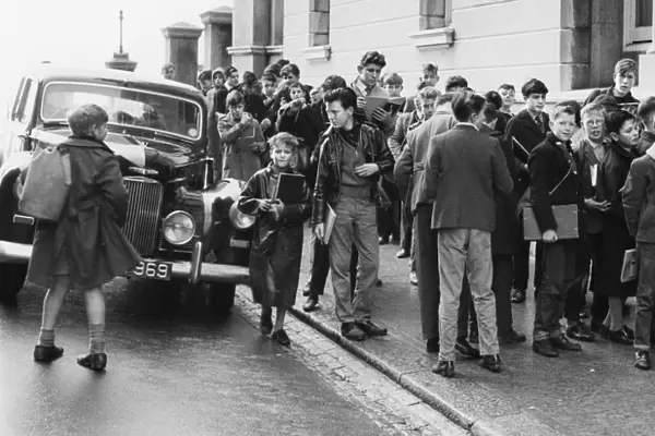 Tottenham Hotspur new striker Jimmy Greaves signs autographs for young fans