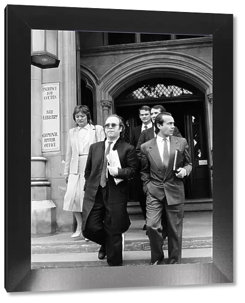 Elton John with Bernie Taupin at the High Court in London
