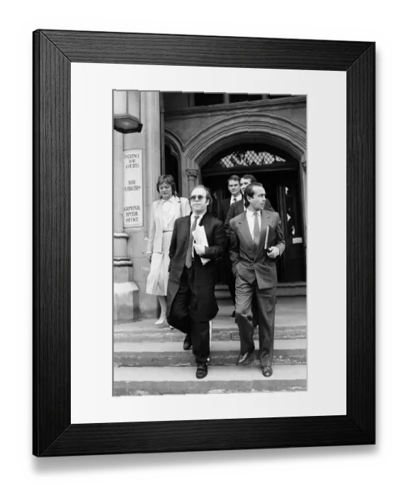 Framed Print : Elton John with Bernie Taupin at the High Court in London