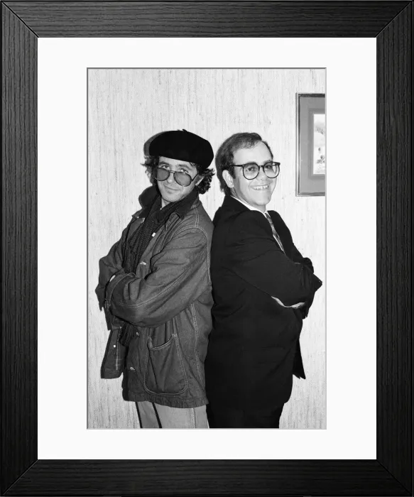 Framed Print : David Essex and Elton John. The two soccer mad fans have just watched their lads do Framed Print : David Essex and Elton John. The two soccer mad fans have just watched their lads do