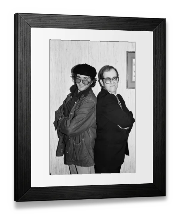 Framed Print : David Essex and Elton John. The two soccer mad fans have just watched their lads do Framed Print : David Essex and Elton John. The two soccer mad fans have just watched their lads do