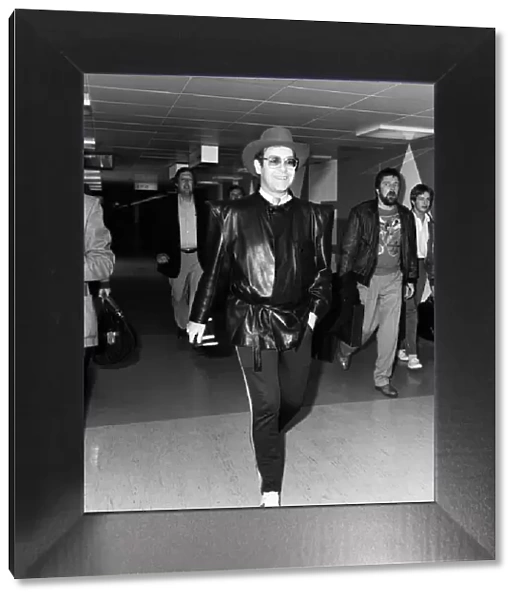 Elton John arriving at Heathrow airport from Copenhagen. 7th May 1982