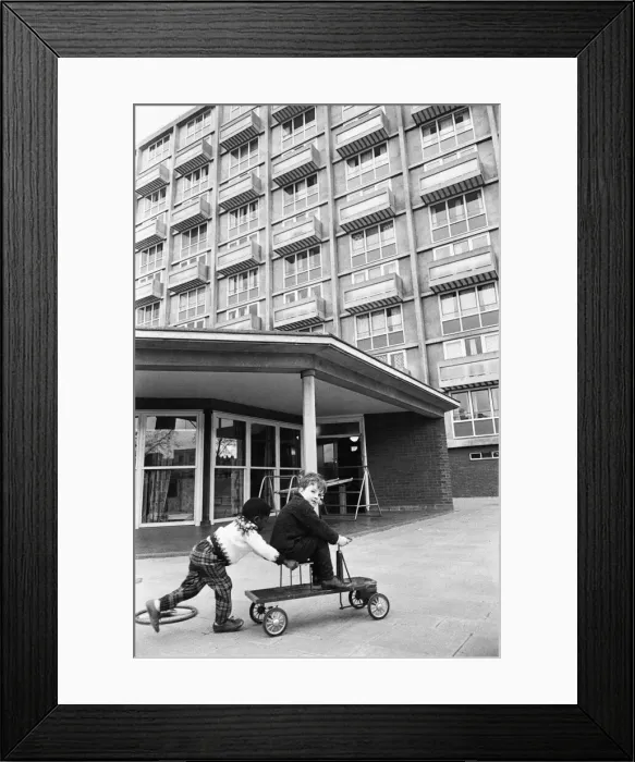 Framed Print : Richard Bailey seen here giving his friend a push during break time at the St Mary Framed Print : Richard Bailey seen here giving his friend a push during break time at the St Mary