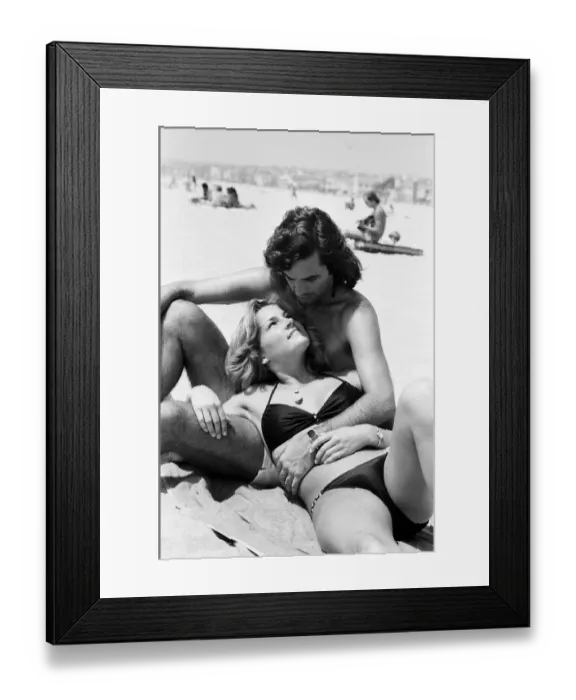 Framed Print : George Best at Hermosa Beach, Los Angeles, California, with his new girlfriend Heidi Framed Print : George Best at Hermosa Beach, Los Angeles, California, with his new girlfriend Heidi