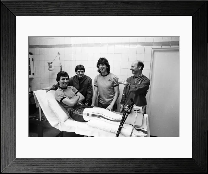 Framed Print : England player sat the treatment table - skipper Bryan Robson gets the attention of Fred Framed Print : England player sat the treatment table - skipper Bryan Robson gets the attention of Fred