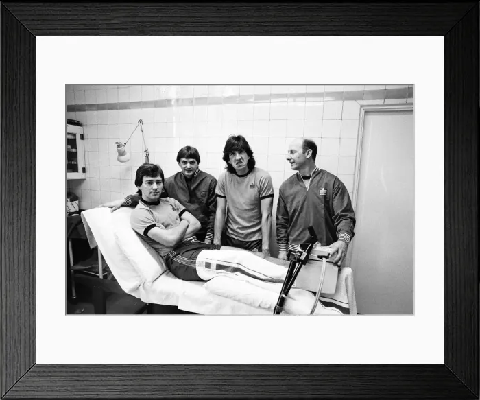 Framed Print : England player sat the treatment table - skipper Bryan Robson gets the attention of Fred Framed Print : England player sat the treatment table - skipper Bryan Robson gets the attention of Fred