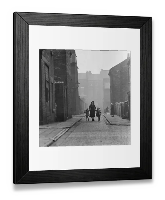 Framed Print : Slum living conditions in the north west of England. 3rd April 1960