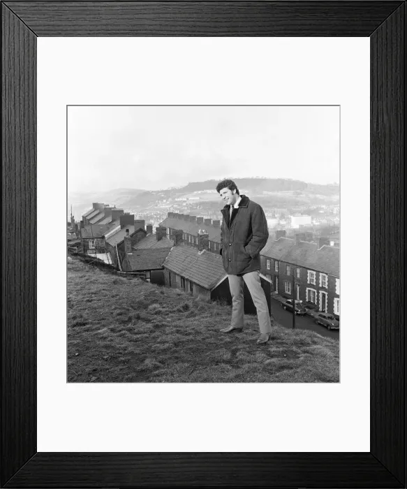 Framed Print : Tom Jones, a boy on top of the world, sings from the mountain top above his hometown of Framed Print : Tom Jones, a boy on top of the world, sings from the mountain top above his hometown of