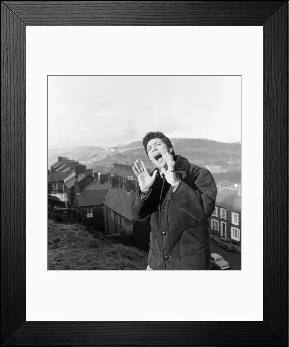 Framed Print : Tom Jones, a boy on top of the world, sings from the mountain top above his hometown of Framed Print : Tom Jones, a boy on top of the world, sings from the mountain top above his hometown of