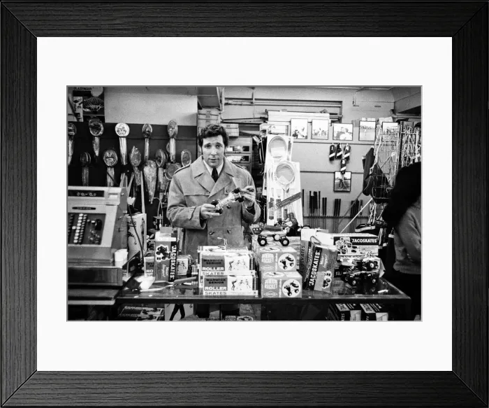 Framed Print : Singer Tom Jones Christmas shopping in London for his 11-year-old son. 3rd December 1968 Framed Print : Singer Tom Jones Christmas shopping in London for his 11-year-old son. 3rd December 1968