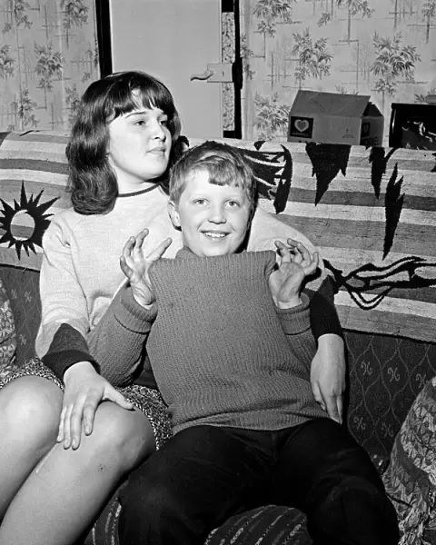 Mark Woodward, aged 8, the son of pop star Tom Jones, pictured at home in Treforest