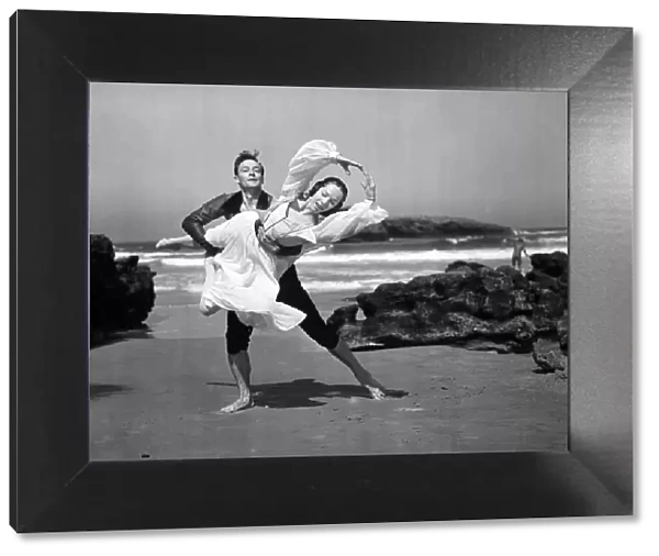 George Skibine and Maria Tallchief, Ballet Dancers performing routine on the beach at