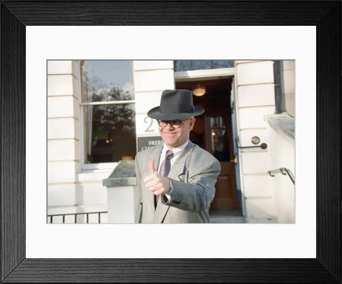 Framed Print : Elton John won £1 million damages from the Sun newspaper Framed Print : Elton John won £1 million damages from the Sun newspaper
