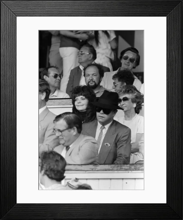 Framed Print : Elton John and his wife Renate watching the Watford v Tottenham Hotspur match Framed Print : Elton John and his wife Renate watching the Watford v Tottenham Hotspur match