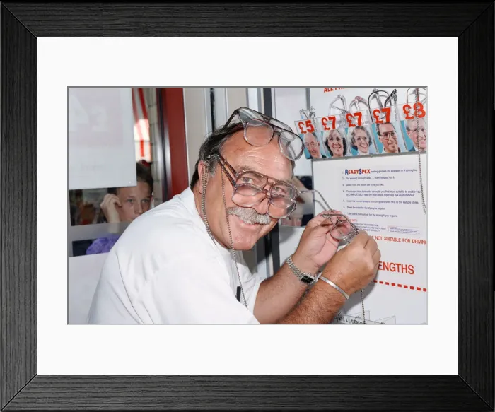Framed Print : Ex footballer Jimmy Greaves at the worlds first spectacle vending machine Framed Print : Ex footballer Jimmy Greaves at the worlds first spectacle vending machine