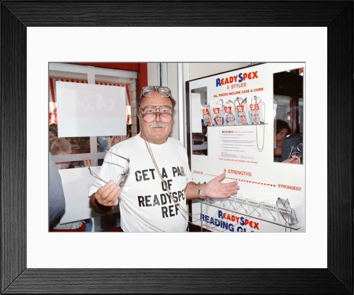 Framed Print : Ex footballer Jimmy Greaves at the worlds first spectacle vending machine