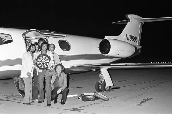 Engelbert Humperdinck arrives by private jet for a darts match. 25th July 1973