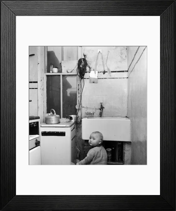 Framed Print : Slum housing in Salford. 1 year old boy Peter. Their home has two rooms up Framed Print : Slum housing in Salford. 1 year old boy Peter. Their home has two rooms up