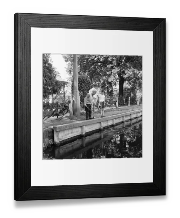 Framed Print : Boys trawling for newts and frogs in the River Sow, Stafford during their school summer