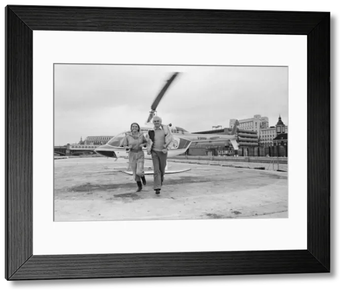 Framed Print : Anneka Rice, pictured in the television helicopter, near Blackfriars in London Framed Print : Anneka Rice, pictured in the television helicopter, near Blackfriars in London