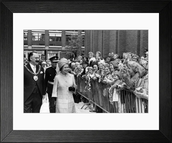 Framed Print : Queen Elizabeth II visits Manchester. The Queen walks through the Manchester Evening News Framed Print : Queen Elizabeth II visits Manchester. The Queen walks through the Manchester Evening News