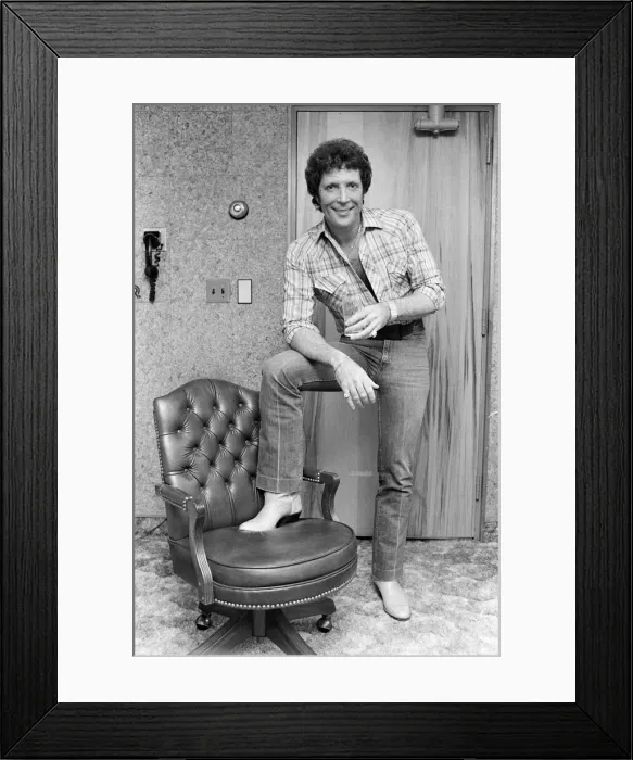 Framed Print : Tom Jones in concert in America. Pictured relaxing backstage. April 1983 Framed Print : Tom Jones in concert in America. Pictured relaxing backstage. April 1983